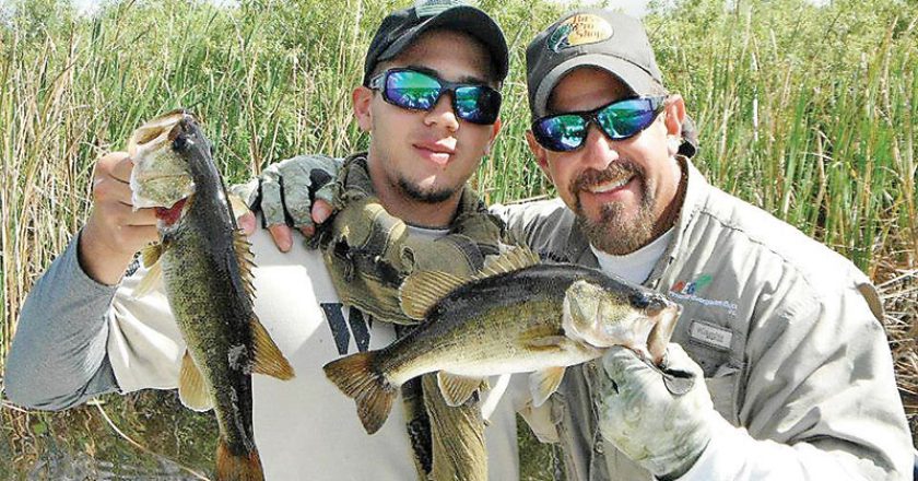 U.S. Marine Jose Jr. caught some largemouth bass fishing deep in the Everglades with Capt. Neal Stark.