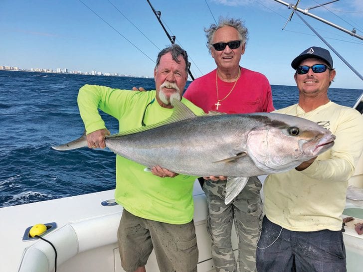 Rod, Tim and John with a big amberjack brought up off a wreck.