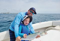 Five year old Jacob caught this cero mackerel with the help of his Uncle Ryan.