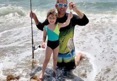 Five year old Stella and her proud dad Rob with her first catch ever, a palometa.