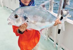 This kiddo caught a very rare African Pompano aboard the Catch My Drift.
