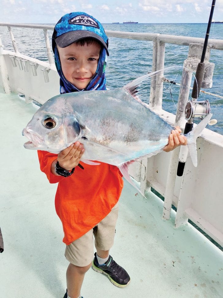 This kiddo caught a very rare African Pompano aboard the Catch My Drift.