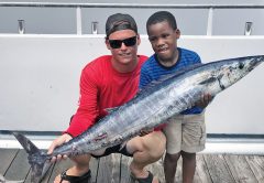 Tyler helped this kiddo catch this nice wahoo fishing with Fishing Headquarters.