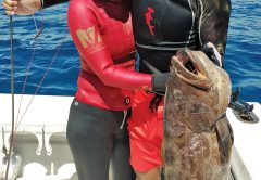 Wayne and Yen with a personal best 31 inch black grouper.