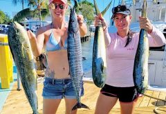 Happy lady anglers after a day offshore with Fishing Headquarters.