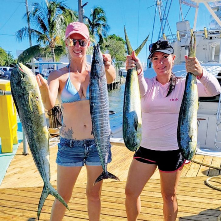 Happy lady anglers after a day offshore with Fishing Headquarters.