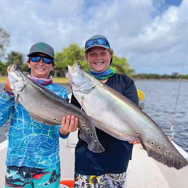 Johnny and Denton doubled up on clown knifefish for Denton’s 13th birthday fishing trip with South Florida Sportfishing.