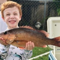 This mangrove snapper put a big smile on 5 year old Shane Prieto’s face.