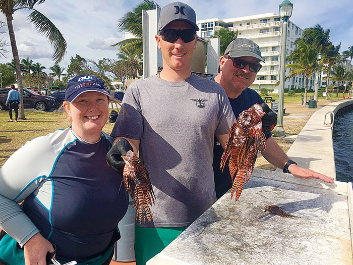 Divers choose sustainable seafood by fishing for lionfish, an invasive species now found throughout Florida reef systems. (Photo by Andrea Whitaker)