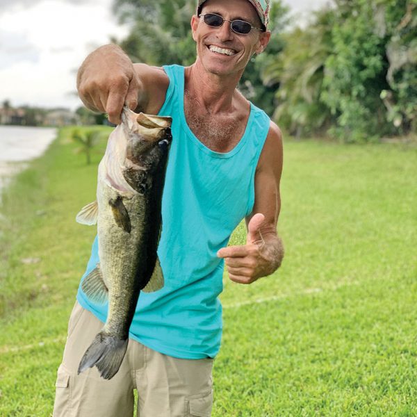 Richard Clavette with a solid backyard largemouth bass.