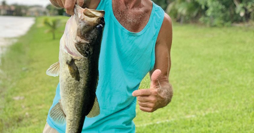 Richard Clavette with a solid backyard largemouth bass.