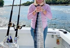 Jessica Montanaro caught this wahoo, her first fish ever, with Father and Son Sportfishing.