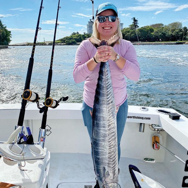 Jessica Montanaro caught this wahoo, her first fish ever, with Father and Son Sportfishing.