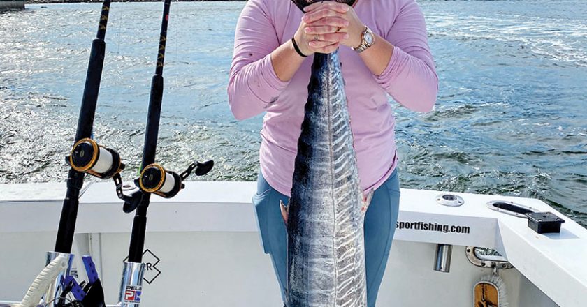 Jessica Montanaro caught this wahoo, her first fish ever, with Father and Son Sportfishing.