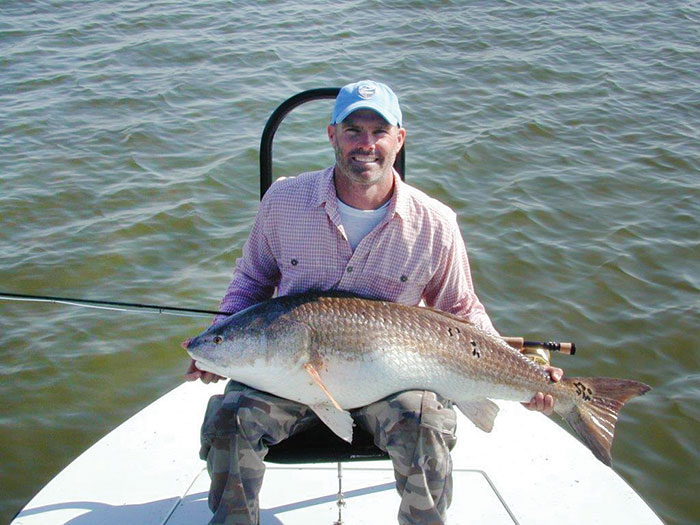 Conway Bowman caught this 41.65-pound IGFA fly-caught world record redfish out of Hopedale, La.
