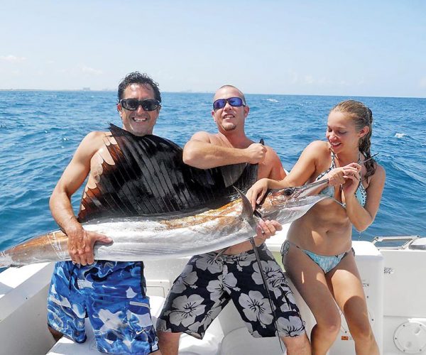 Ali caught her first sailfish with Team Nice Racks and it was love at first sight.