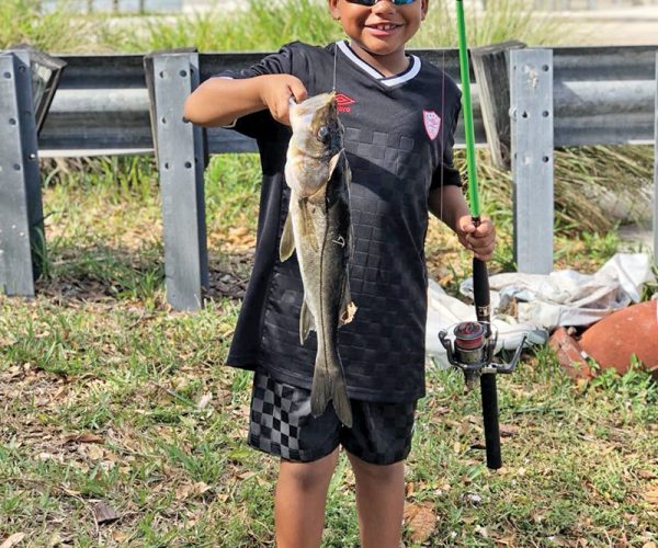 Six year old Sandro caught his personal best freshwater snook on a live shiner.