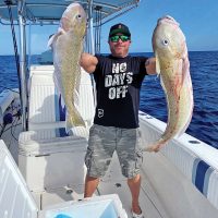 Two big golden tilefish caught deep dropping with Family Jewell Sportfishing.