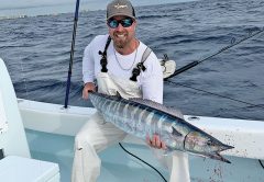 Capt. Ryan Palmer with a solid wahoo caught high speed trolling in 200 feet of Fort Lauderdale.