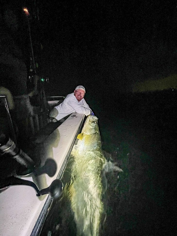 Win Farnsworth with a huge tarpon caught and released with South Florida Fishing Charters.