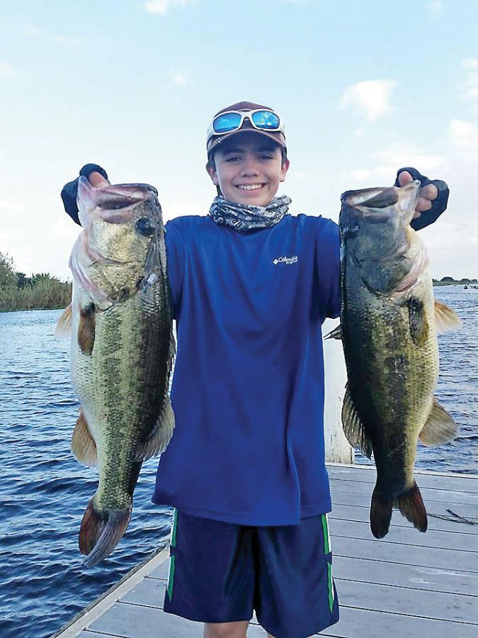 Robert Di Nino, 13, with his big bass  he caught in a Gambler tournament  on  Lake Okeechobee.