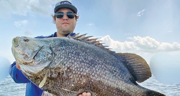 Hunter with a nice tripletail caught in the IRL.