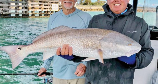 Fred from Jacksonville with one of the big redfish from Sebastian Inlet!