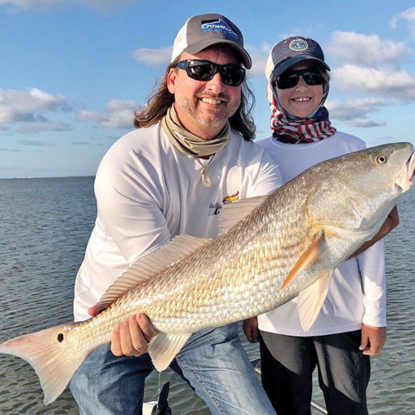 David and his son Tyler hooked this nice redfish in the Mosquito Lagoon with Capt. Travis Tanner.