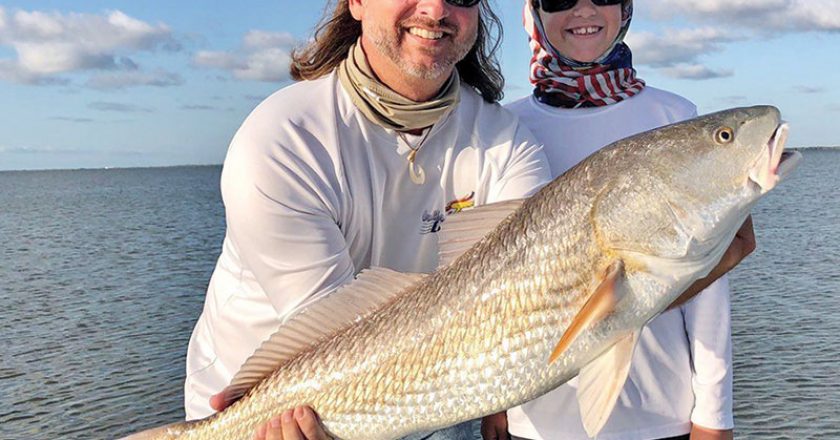 David and his son Tyler hooked this nice redfish in the Mosquito Lagoon with Capt. Travis Tanner.