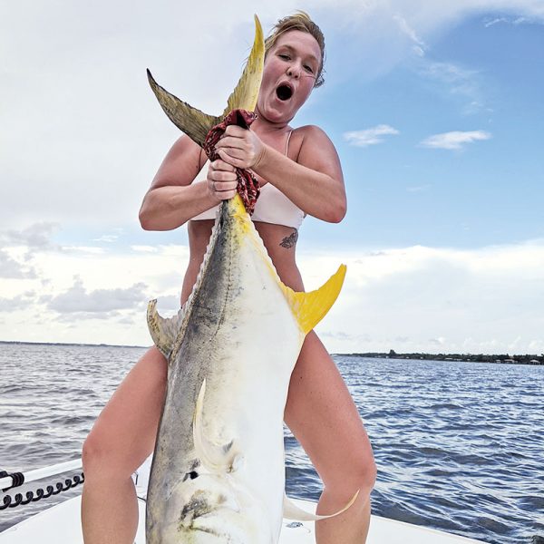 Elisa battled this monster jack crevelle for 45 minutes in the Indian River. Caught on a live hoglegs mullet. What a beast!