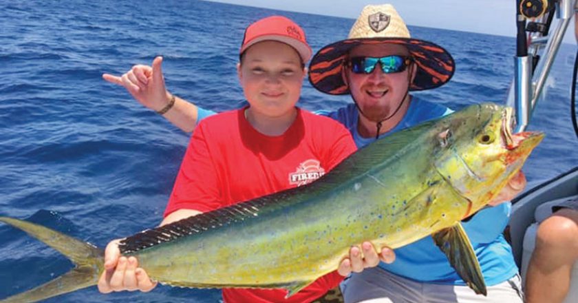 Junior angler nabbed a respectable mahi mahi offshore fishing with Fired Up Charters.