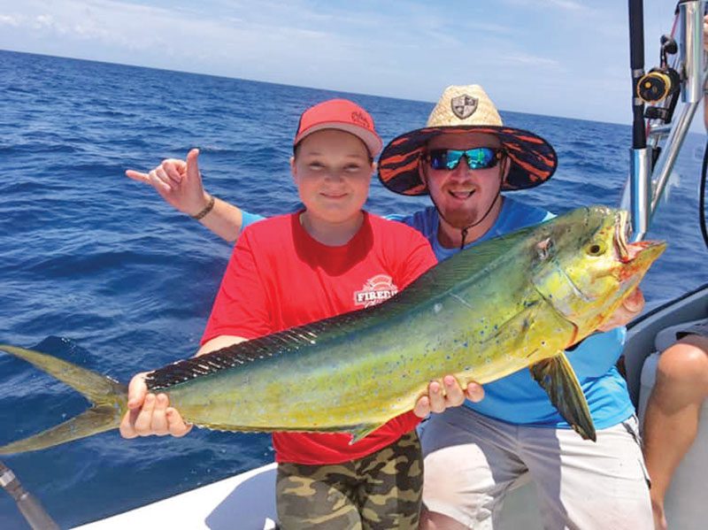 Junior angler nabbed a respectable mahi mahi offshore fishing with Fired Up Charters.