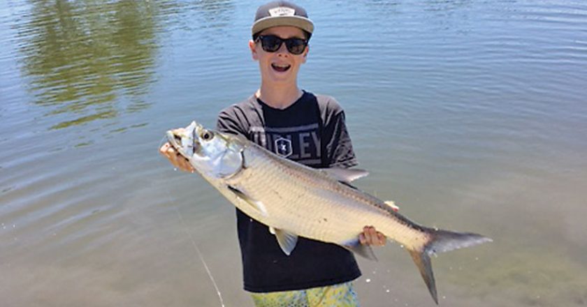 Kai Hobbs was fishing for bass with live bluegill and, when he hooked up, thought he had a pond record bass until he saw it jump and realized he caught his first freshwater tarpon!