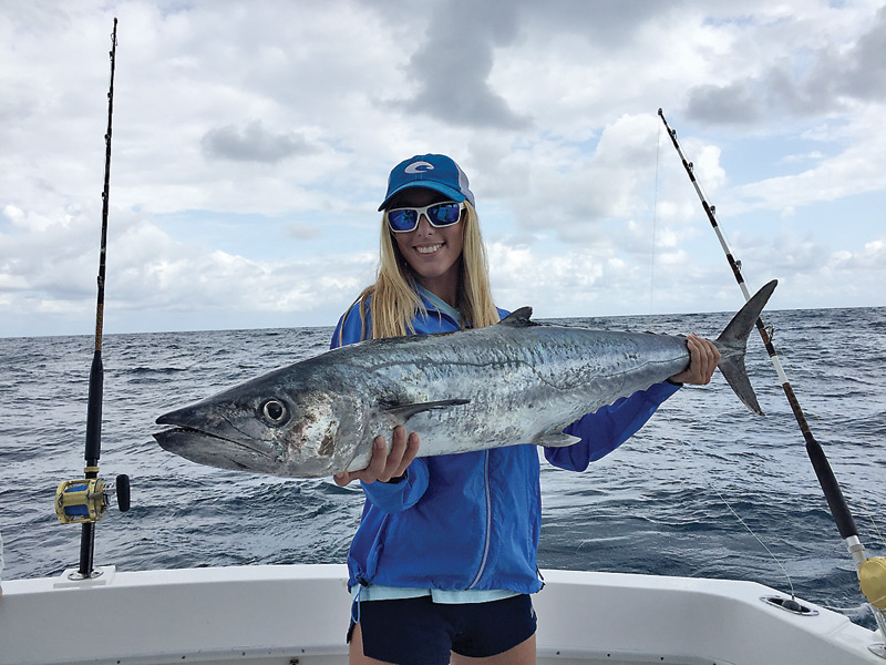 Veronica-Blaze-with-a-huge-kingfish-caught-with-Fishing-Headquarters