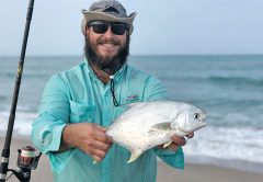 Eric Newton, “exercising social distancing,” with a Florida pompano.