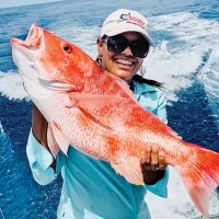 Claudia Patrizio shows off her first red snapper ever, caught recently off Cape Canaveral. Nice job!