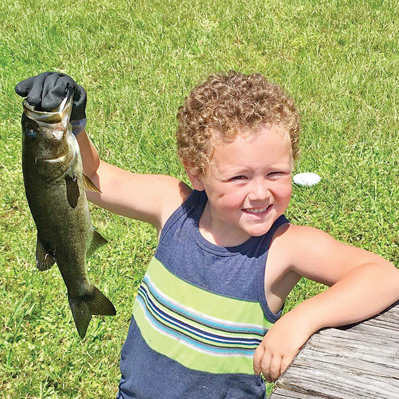 https://coastalanglermag.com/wp-content/uploads/2017/02/5-year-old-Zeke-Thoms-caught-this-dandy-largemouth-bass-all-by-himself.-Zeke-was-using-his-grandpas-shiners-provided-by-Oyster-Island-Bait.jpg