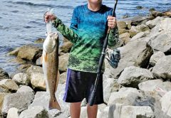 8 year old Devon Johsnston with a nice Destin red. His mission accomplished!