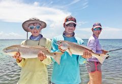 A couple of nice redfish caught by brothers Jack and Nathan.
