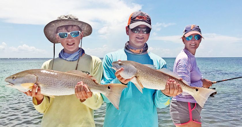 A couple of nice redfish caught by brothers Jack and Nathan.