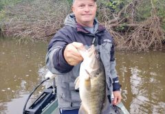 Aaron with a nice Flint River shoal bass. More about him and that river coming soon...