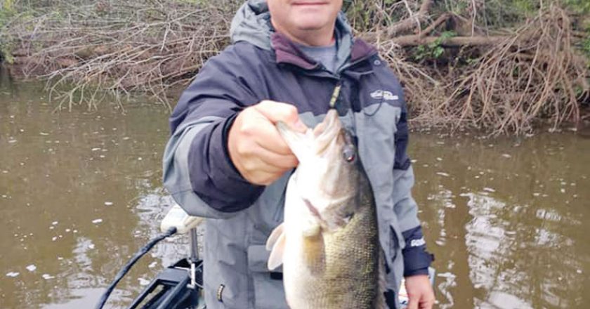 Aaron with a nice Flint River shoal bass. More about him and that river coming soon...