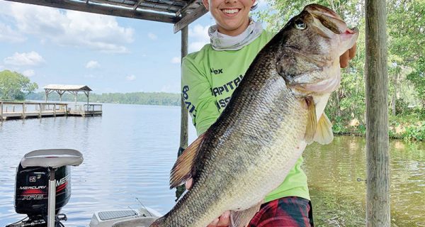 Alex Williams with a double-digit Talquin bass fishing with his dad, Colt.