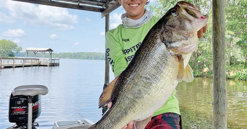Alex Williams with a double-digit Talquin bass fishing with his dad, Colt.