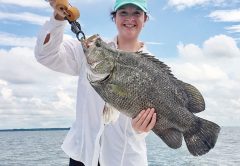 Ali Hall with a massive tripletail with Robinson Brothers Guide.