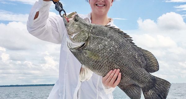 Ali Hall with a massive tripletail with Robinson Brothers Guide.