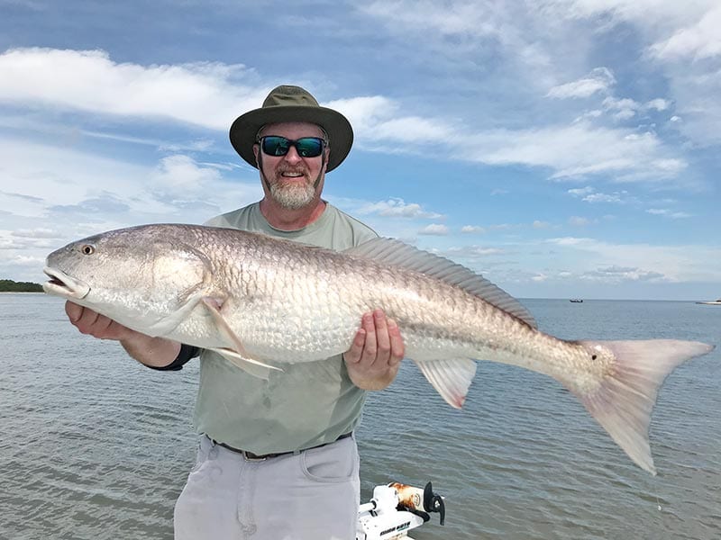 Art Slike, from Indiana, with his first ever bull red.