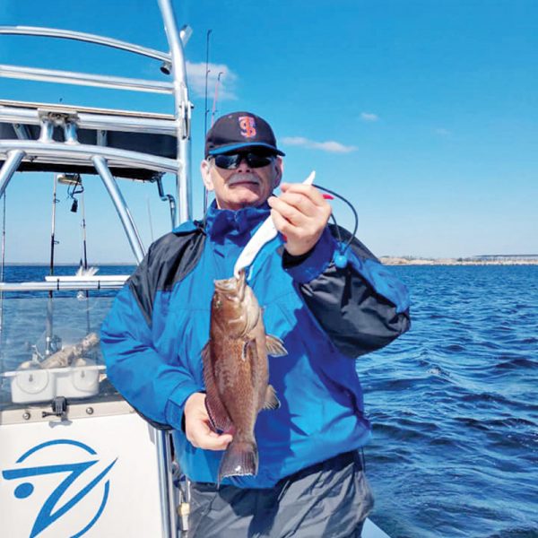 Bob Hill with a scamp caught in the bay.