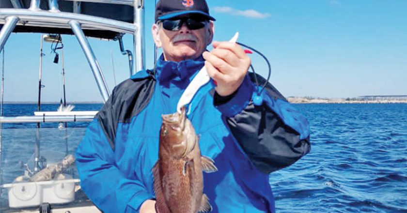 Bob Hill with a scamp caught in the bay.