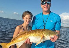 Bob Schoen and his daughter Frances haulin’ reds.